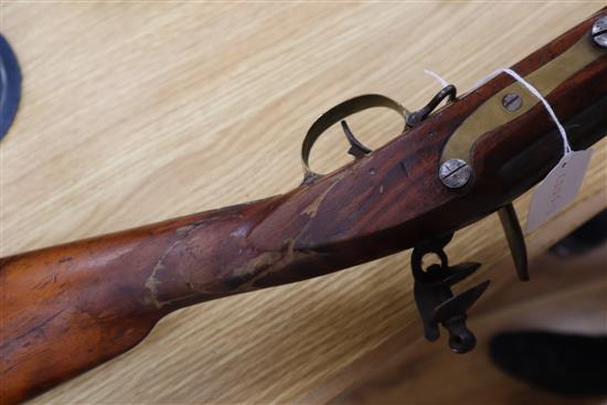 A 19th century Brown Bess-type flintlock musket, Jaipur Armoury, stamped JPR/EXR/ 336 length 142cm, restoration to stock